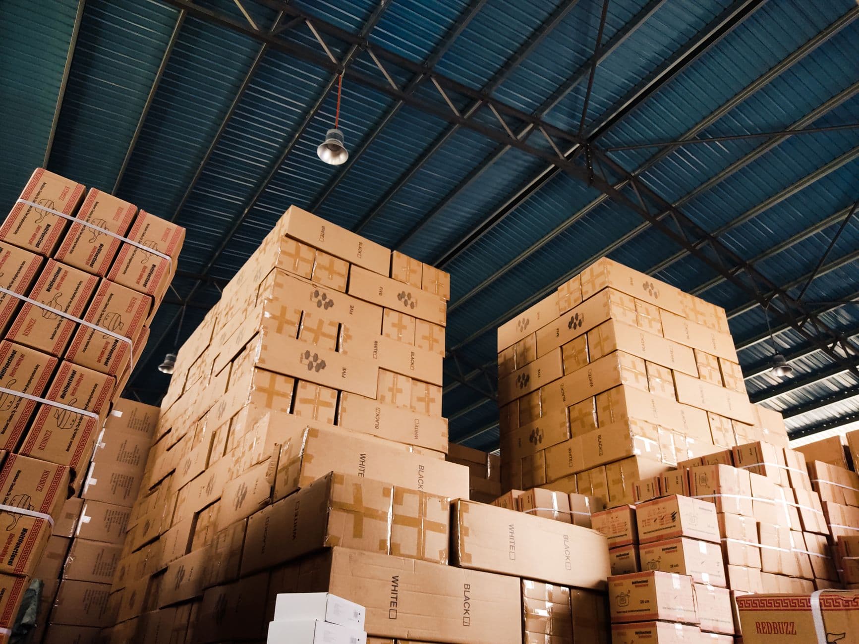 Boxes stacked inside a distribution warehouse
