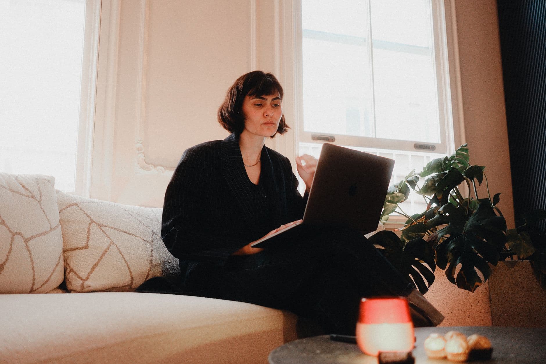 Professional working on a laptop at home