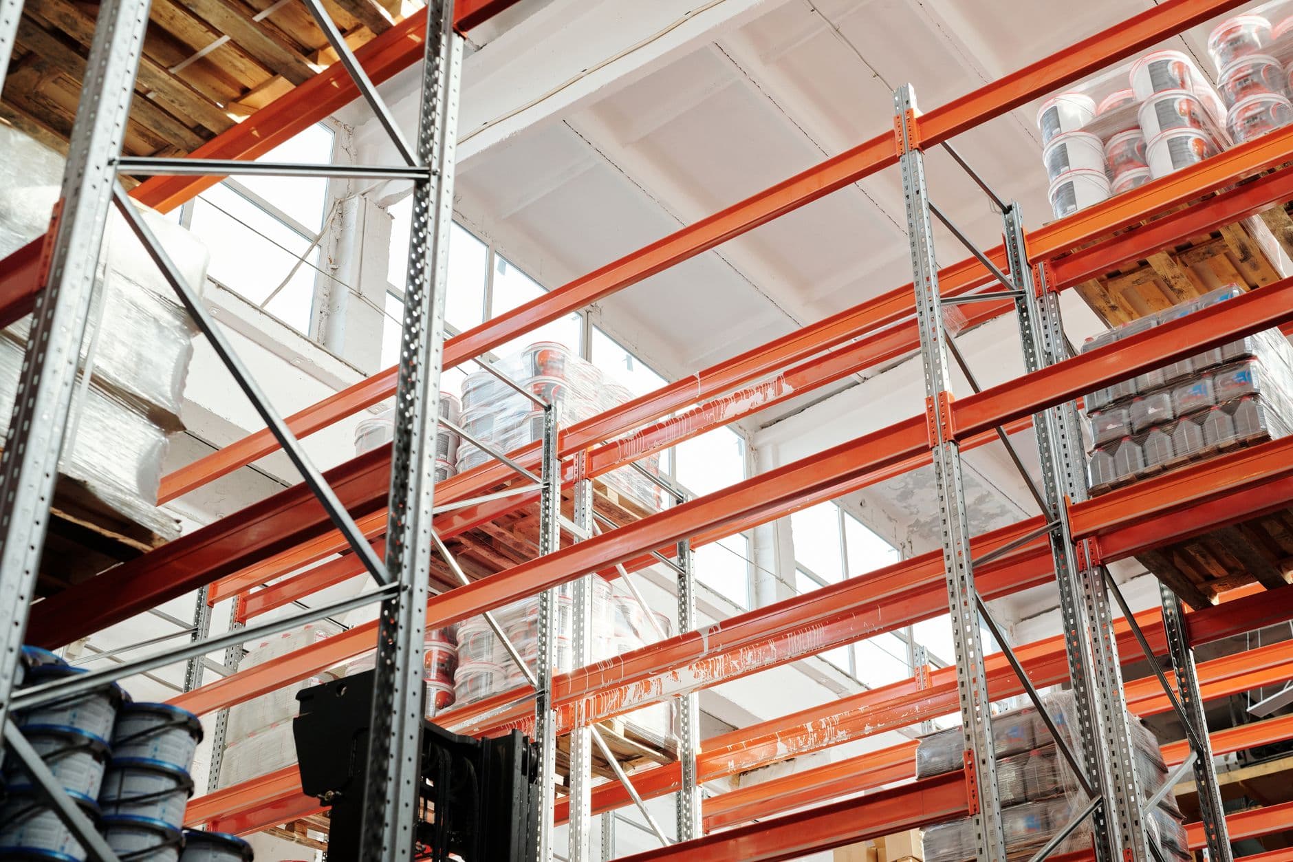 Warehouse shelves holding palletized business inventory